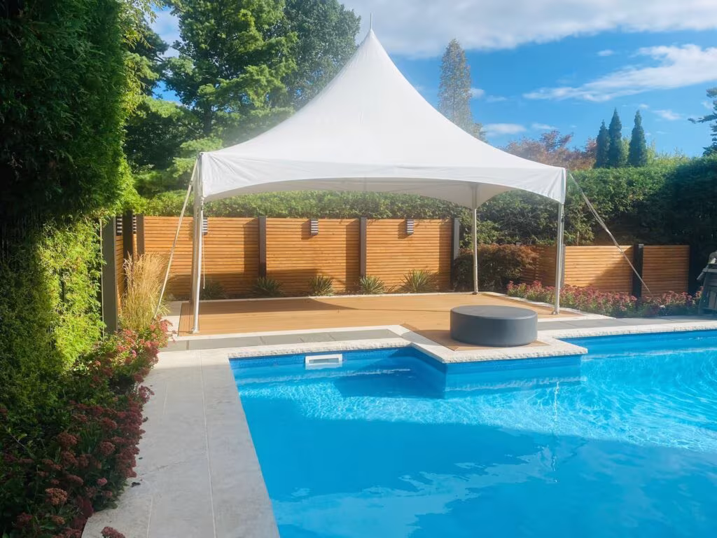 10x20 high peak marquee tent by the pool side
