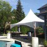 15x20 high peak marquee tent by poolside