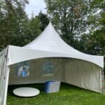 15x20 high peak marquee tent with 3 sides and globe lights