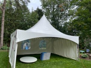 15x20 high peak marquee tent with 3 sides and globe lights