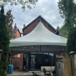 20x20 high peak marquee tent with globe lights