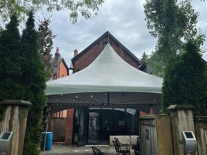 20x20 high peak marquee tent with globe lights