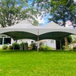 20x30 high peak marquee tent on grass without sides