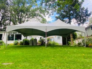 20x30 high peak marquee tent on grass without sides