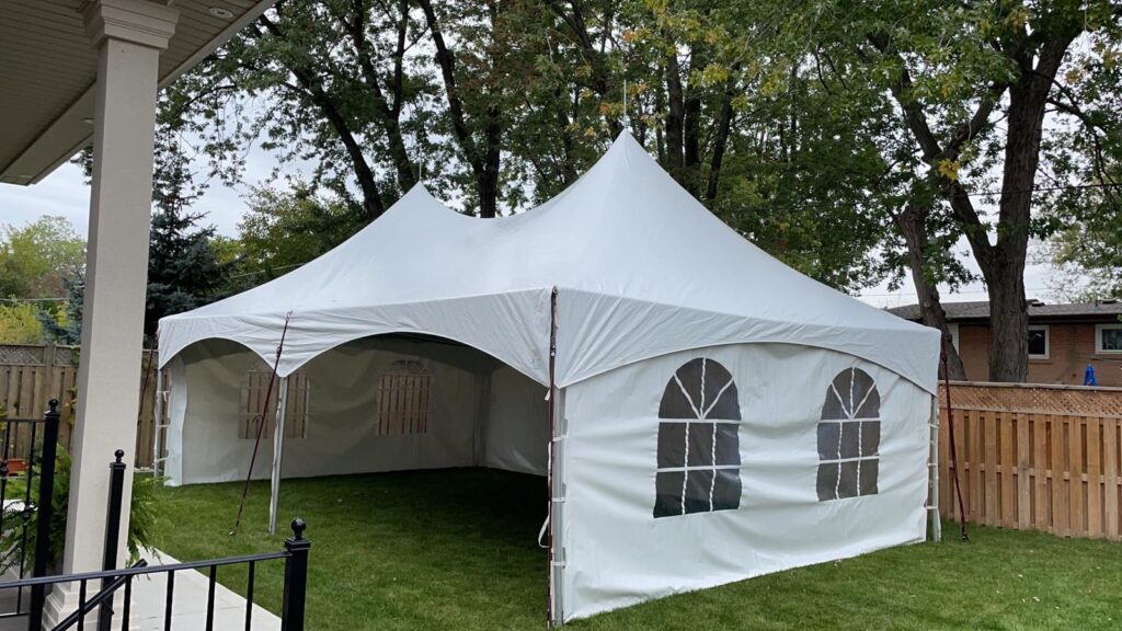 20x30 high peak marquee tent with french window walls on grass