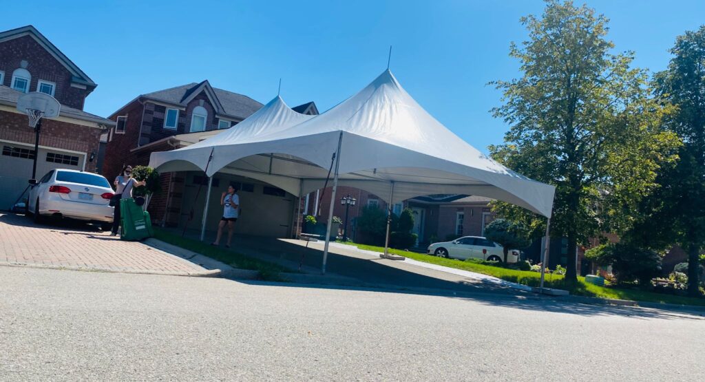 20x40 high peak marquee tent on a driveway