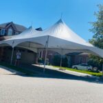 20x40 high peak marquee tent on a driveway