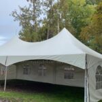 20x40 high peak marquee tent with french window walls and globe lights 1