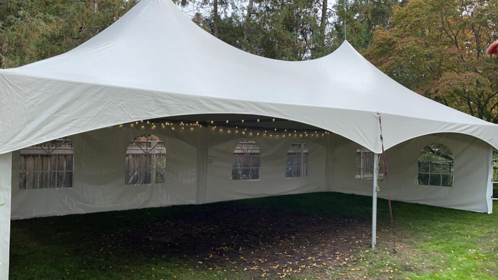 20x40 high peak marquee tent with french window walls and globe lights 2