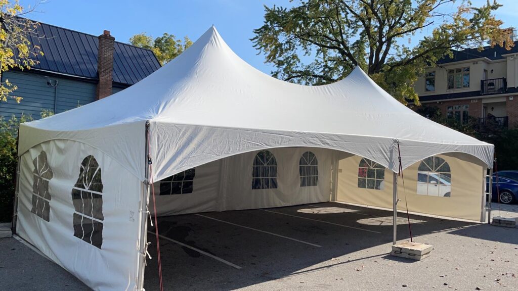 20x40 high peak marquee tent with french window walls on parking lot