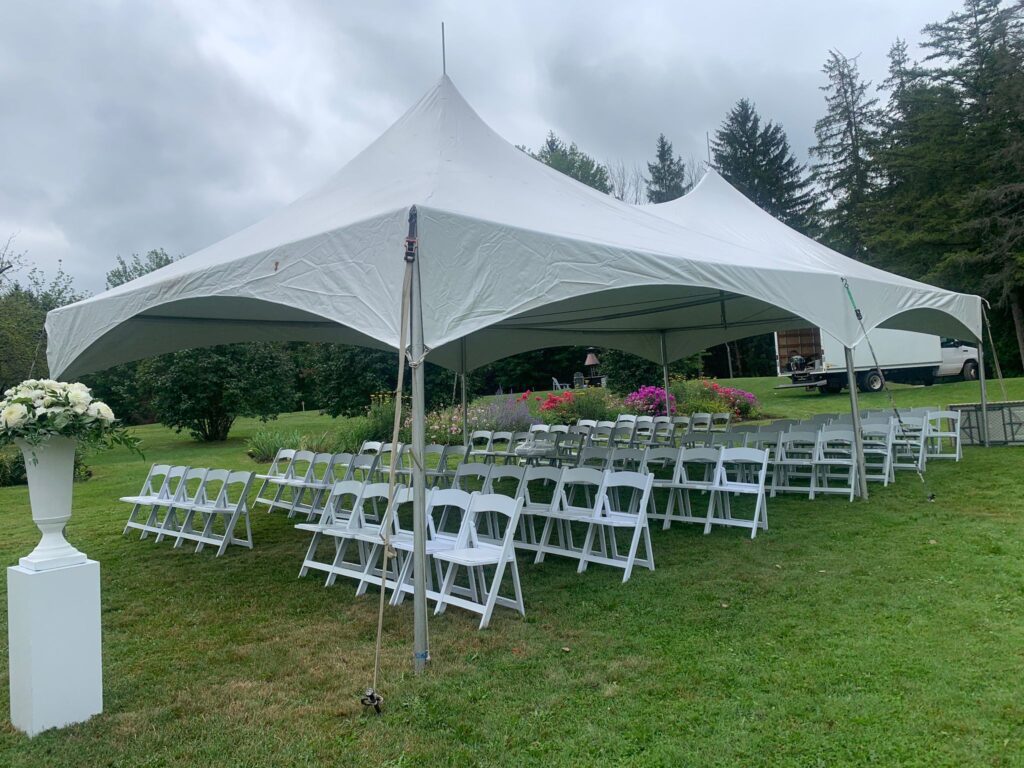 20x40 high peak marquee tent with white resin chairs