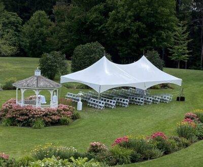 20x40 high peak marquee tent with white resin chairs 2