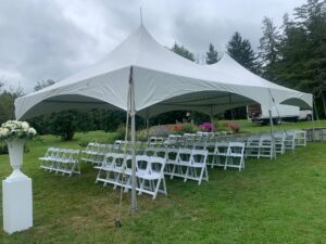 20x40 high peak marquee tent with white resin chairs