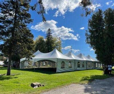 40x80 high peak marquee tent with french window walls on grass 3