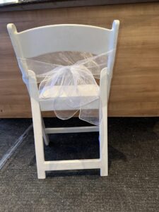 Resin chair with a white bow (Back)