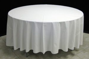 round table with white linen